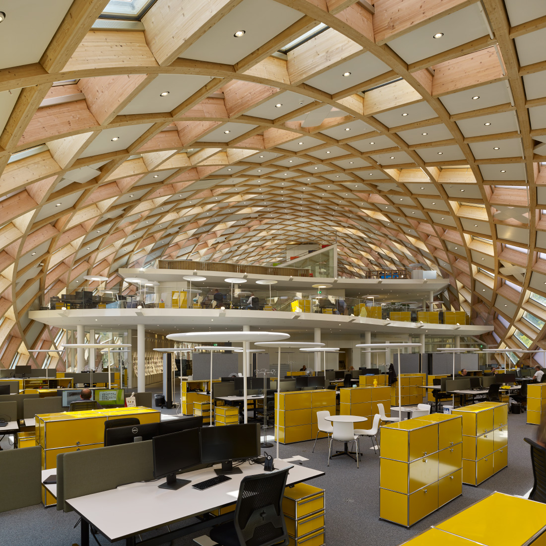 Interior of the Swatch office, with a timber coffered ceiling
