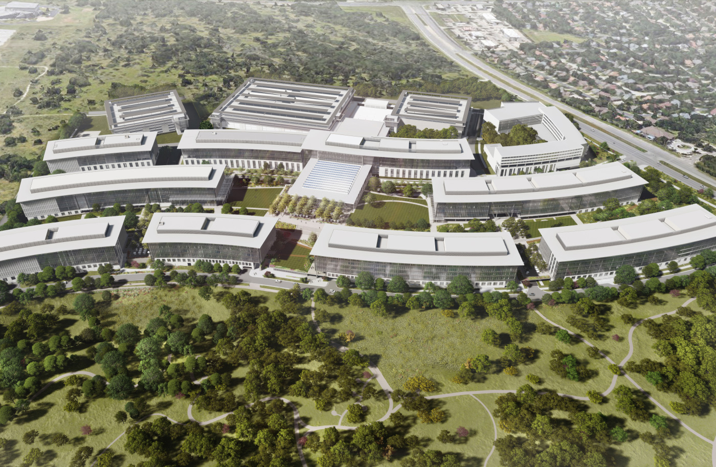 空中绘制的德州苹果新园区，描绘了10座蜿蜒的白色办公大楼