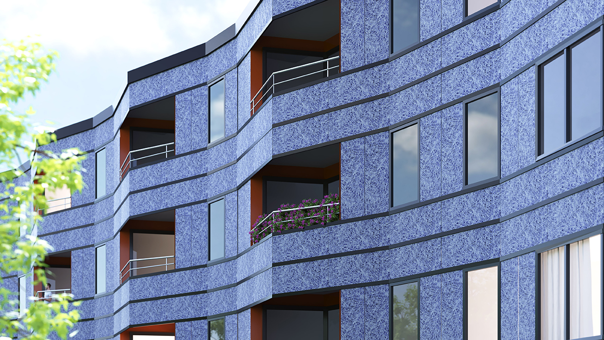 一幢建筑的表面略显多面，上面有一块带蓝色划痕图案的太阳能电池板。