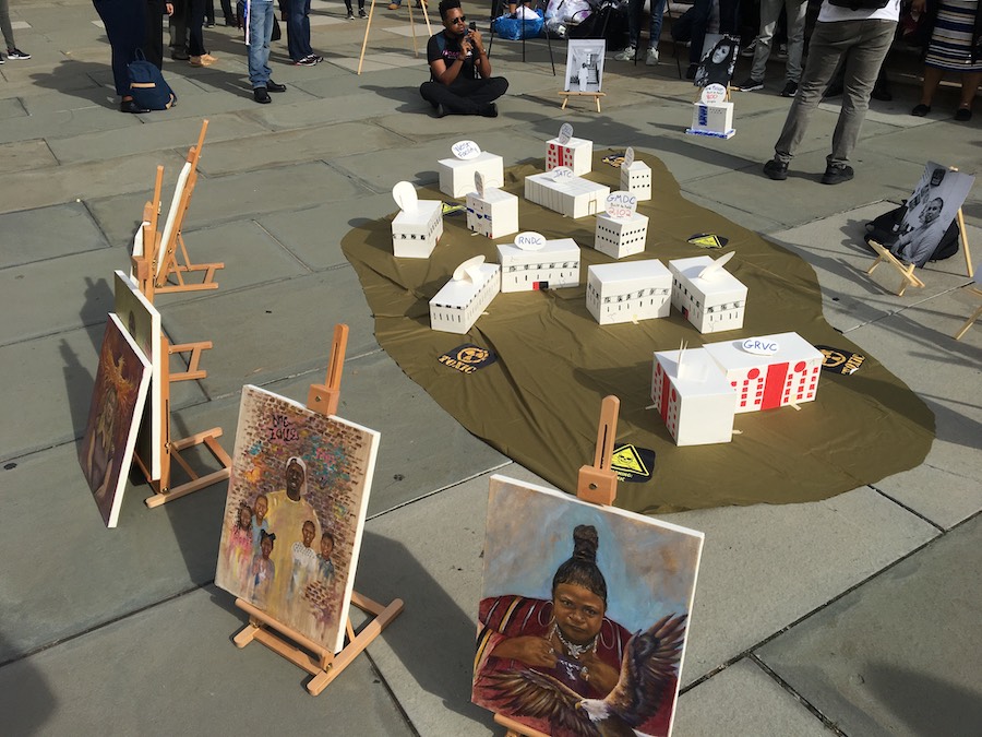 Photo of a Rikers demonstration on a sidewalk outside of a courthouse