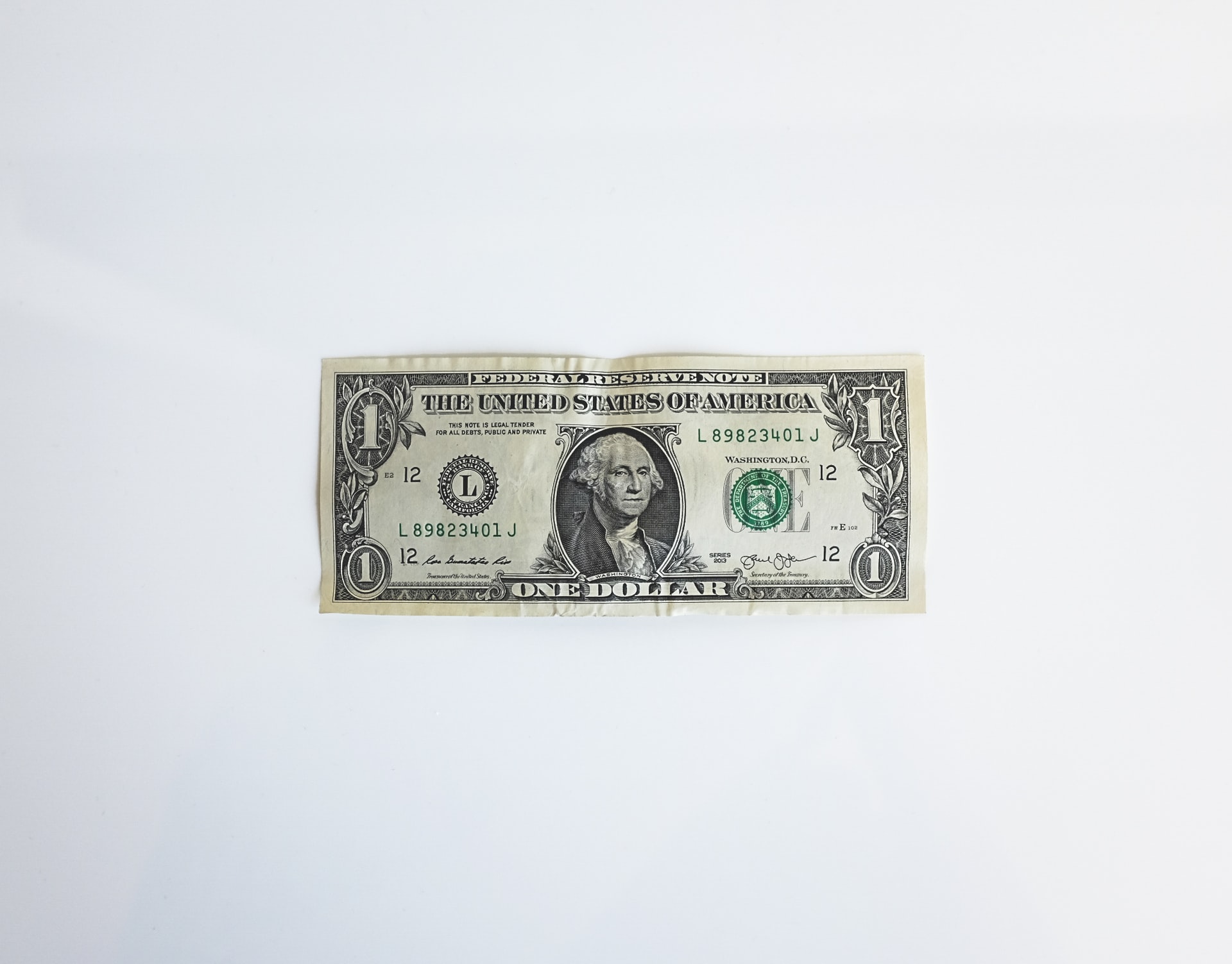 一张一美元钞票的照片。这些钱可以作为冠状病毒救援工作的一部分获得