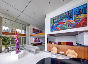 一座现代主义住宅的室内，虚拟窗户上画满了画