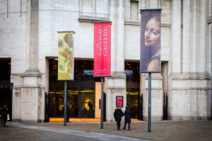 entrance to a london museum, the national gallery, with banners