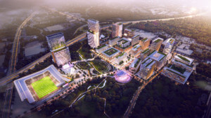 一个名为Downtown South的规划开发区的鸟瞰图，该开发区有一个足球场