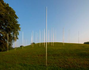 metal poles in a field arranged for exhibit columbus