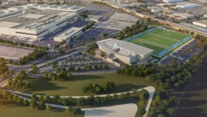 aerial rendering of a pro football training facility and headquarters building for the chargers