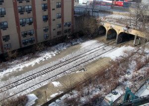 An abandoned train platform that will become part of the Interborough Express