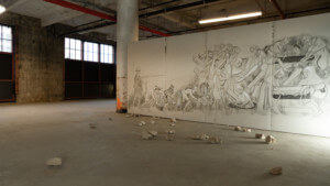 inside the Adelita Husni Bey show these conditions with a large wall mural