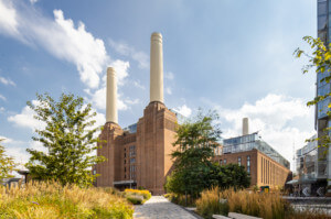 brick exterior of battersea power station with two turbines