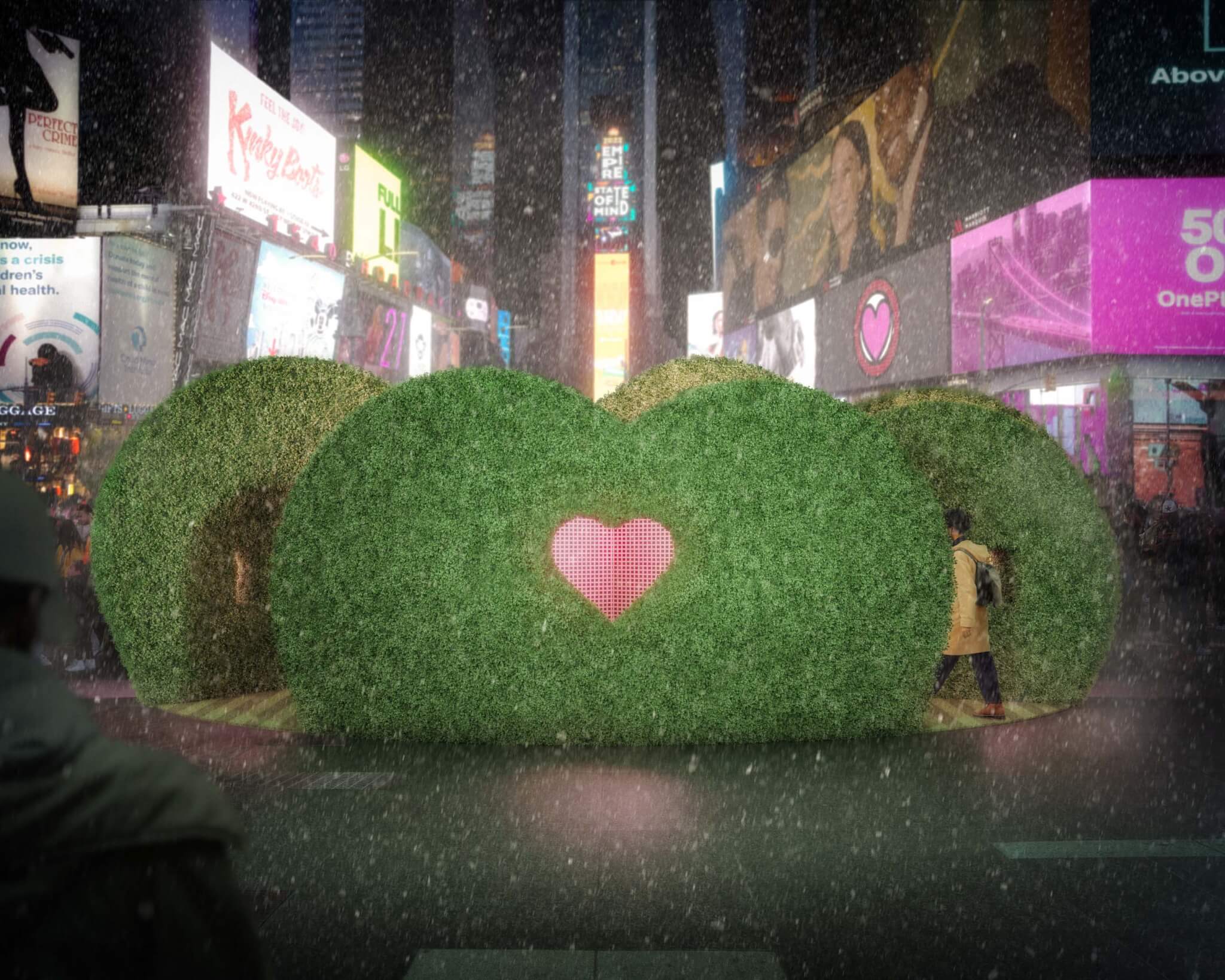 夜晚时代广场的绿色树篱雕塑